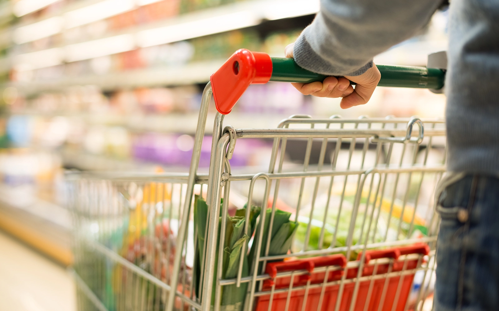 Vail Valley Home Watch concierge stocking groceries at a local Colorado market before a homeowner's arrival