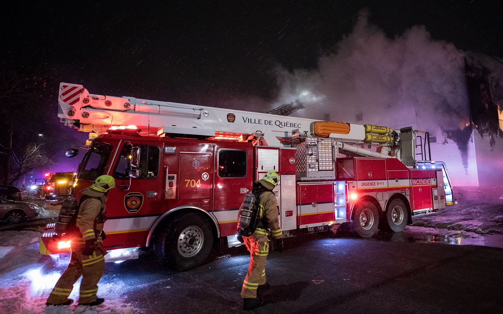 Firefighters responding to a nighttime emergency — Vail Valley Home Watch coordinates after-hours emergency response for Colorado second homeowners
